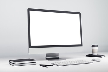 Mock up of modern computer with white screen on desktop. 3D Rendering