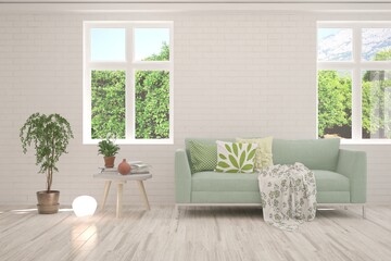 White living room with sofa and summer landscape in window. Scandinavian interior design. 3D illustration