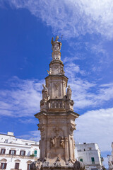 Fototapeta na wymiar Saint Orontius' column in Ostuni old town, Italy.