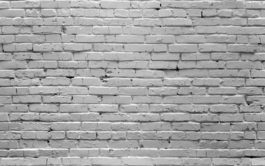 Seamless texture of rough brick wall painted white
