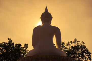 Big White Buddha Statue on Moment of Color of Dawn.