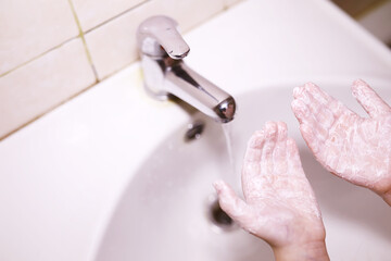 Hygiene rules. Hand washing before meals. Antibacterial treatment of hands with soap. A way to prevent virus infection. Coronavirus protection.