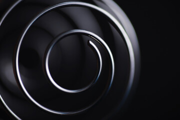Metal spiral. The concept of endless turns. Golden ratio. The concept of memories and life path.