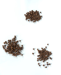 heap of coffee beans isolated on white background.