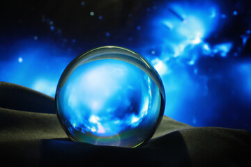 Astrological background. Crystal ball with predictions. Horoscope of the stars. Fortune telling and determination of fate. Soothsayer with a crystal ball.
