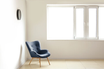 Armchair in empty spacious room