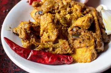 Closeup of Mangsho Kosha or Bengali Style Chicken Curry in a Plate