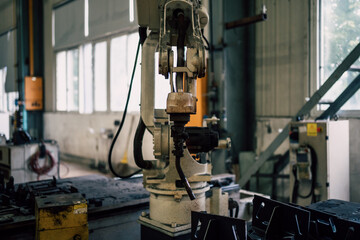 robot arm working in factory