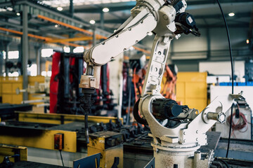 robot arm working in factory