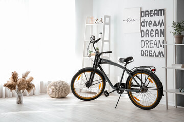 Stylish interior of room with bicycle