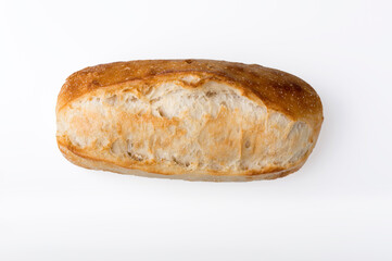 Small french baguette isolated on light background.