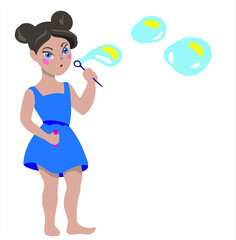 The girl inflates soap bubbles. Summer fun.