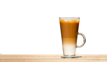 Closeup one glass with ice latte on wooden table. Selective focus