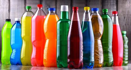 Plastic bottles of assorted carbonated soft drinks