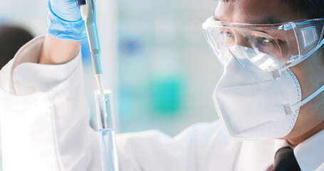 scientist take test tube