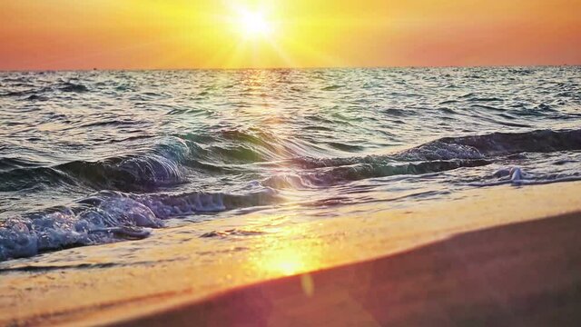 beach wave splashing macro in sunset