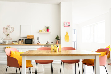 Clean dining table in modern kitchen