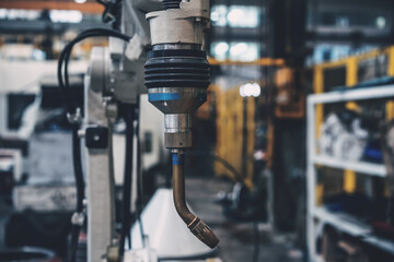 robot arm working in factory