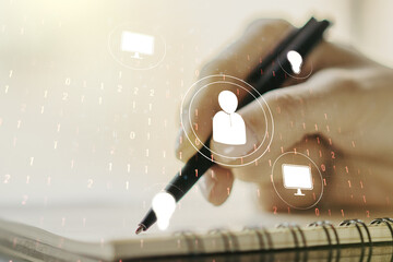 Social network media concept with man hand writing in diary on background. Double exposure