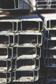 Mild Steel Lip Channels stacked in the stock yard of a steel and pipe hardware supplier.