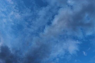 Fototapeta premium Blue evening sky with a band of beautiful clouds.