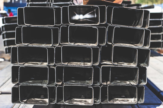 Mild Steel Lip Channels stacked in the stock yard of a steel and pipe hardware supplier.