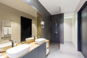 Interior of a hotel bathroom interior with shower cabin