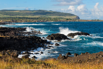 Fototapeta na wymiar Waves crashing on the rocks, Hanga Roa, Rapa Nui National Park, Easter Island, Chile, Unesco World Heritage