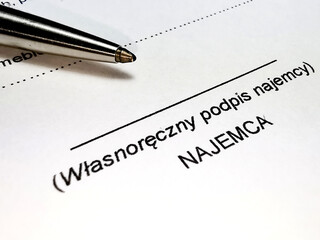 Obraz premium Mietvertrag auf polnisch und Unterschrift Mieter