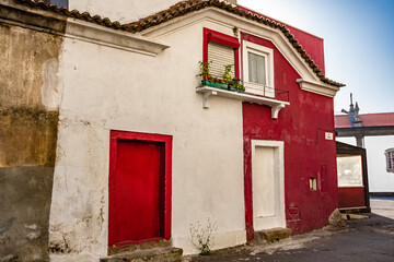 Fototapeta na wymiar Red And White House And Doors, Braga, Portugal