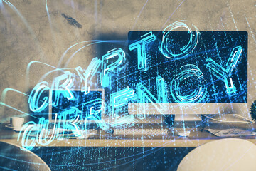 Multi exposure of blockchain theme hologram and table with computer background. Concept of bitcoin crypto currency.