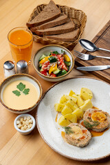 High angle, top view advertisement photo of fully set table in a cafe, wooden table, three course...