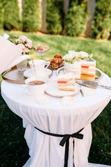 Table setting, tea party, ceramic teapot