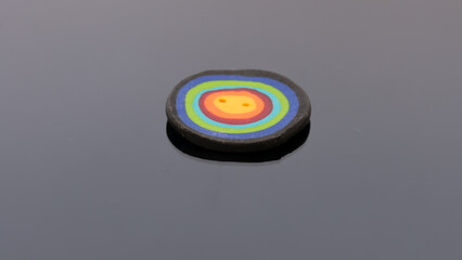 colored rainbow button - LGBT theme - isolated on mirror board