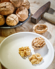 still life with walnuts on wooden table