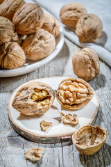 still life with walnuts on wooden table