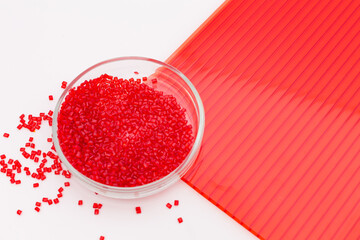 Colored plastic sheet PC panel. Bright red translucent roofing sheet. Hollow Polycarbonate Sheet Roofing Panel Colored Plastic Production. Color polycarbonate plastic granules