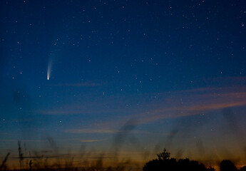 Fototapeta premium Bright gorgeous Comet NEOWISE or C/2020 F3 over Europe July 19-20, 2020
