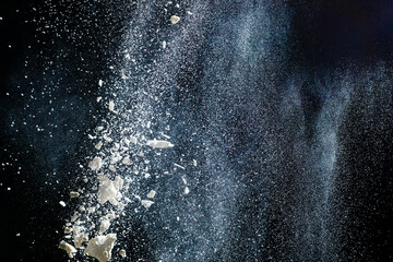 Abstract design of white powder cloud isolated on black, dark background. Abstract design of white dust cloud. Particles cloud screen saver, wallpaper.