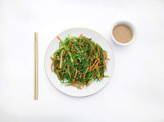 Salad with chuka and peanut sauce