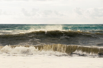 Stormy weather, waves and splashes in Batumi, Georgia. Stormy Black sea.