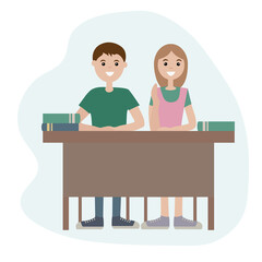 Fototapeta premium Teenage schoolchildren sitting at the desk. A girl with her hand up. Back to school. 