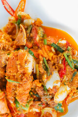 Stir Fried Crab with Curry Powder Thai food on white plate