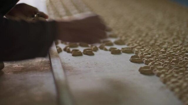 Moroccan artisan's hands Close-up working on Wall Art