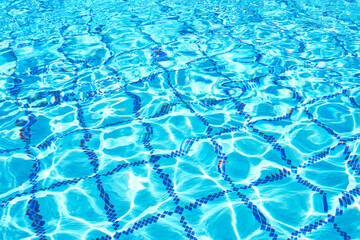 Fototapeta na wymiar Abstract pool water surface, vibrant blue colors. Perfect backdrop