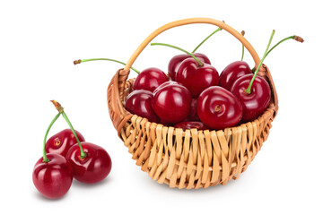 red sweet cherry in a wicker basket isolated on white background with clipping path and full depth of field