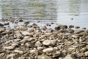 Stones by the lake, details of nature, beautiful landscape
