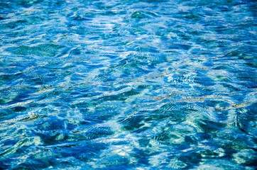 Fototapeta na wymiar Blue water surface abstract background