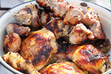 Grilled barbecue meat with a crust on dish