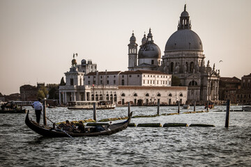 Fototapeta na wymiar Venice's Architectural Treasures: Admiring the Salute, Basilicas, and Bridges Along the Grand Canal